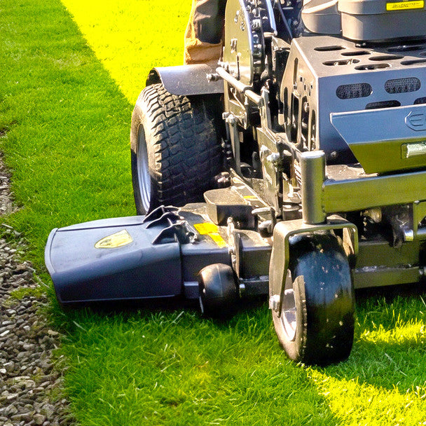 Close-up of a Cobra ZTS32L lawn mower with side discharge on grass