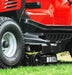 Close-up of Cobra lawn tractors anti-scalp wheels on grass