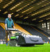 Cobra Fortis Stadium 34' EGO Powered being used in a stadium, viewed from the side.