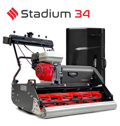 Cobra Fortis Stadium 34'powered by Honda petrol engine. Main image on white background. Image from front right quarter with grass box behind 