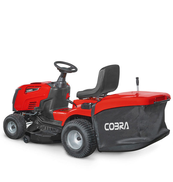 Red and black Cobra ride on lawn mower from the back quarter on a white background