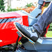 Person stepping on the hydro drive pedal on a cobra premium lawn tractor 