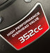 Close up Cobra High performance valengine ve with '352CC' label on a black background