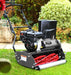 Image of Cobra Fortis 17b with grass box behind on lawn with blurred background