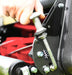 Cobra Forti 17b Close up of a man's hand adjusting the cut height control.
