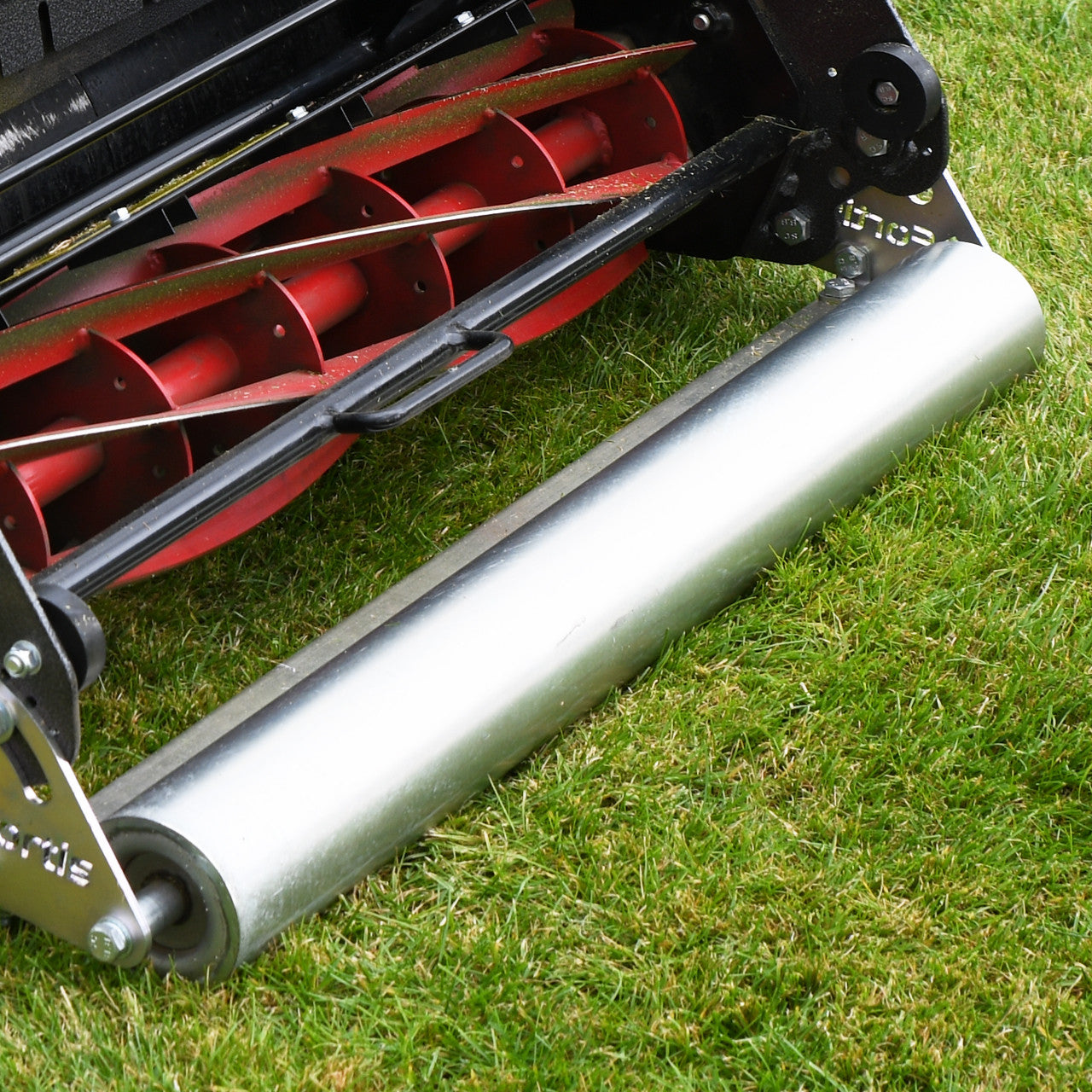 Close up of Cobra Fortis stadium 34' Garden roller on grass