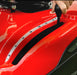 Cobra ride on mower, Red vehicle with a hand adjusting the deck height component 