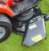 Close-up of a cobra ride on lawn tractorside discharge shoot on grass with a visible brand logo.
