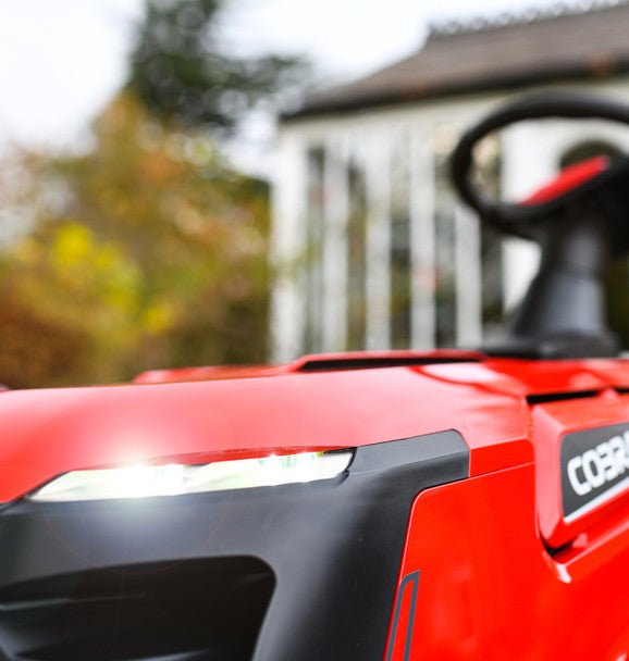 Close-up of a cobra lawn tractor ultra bright LED lights with a blurred background