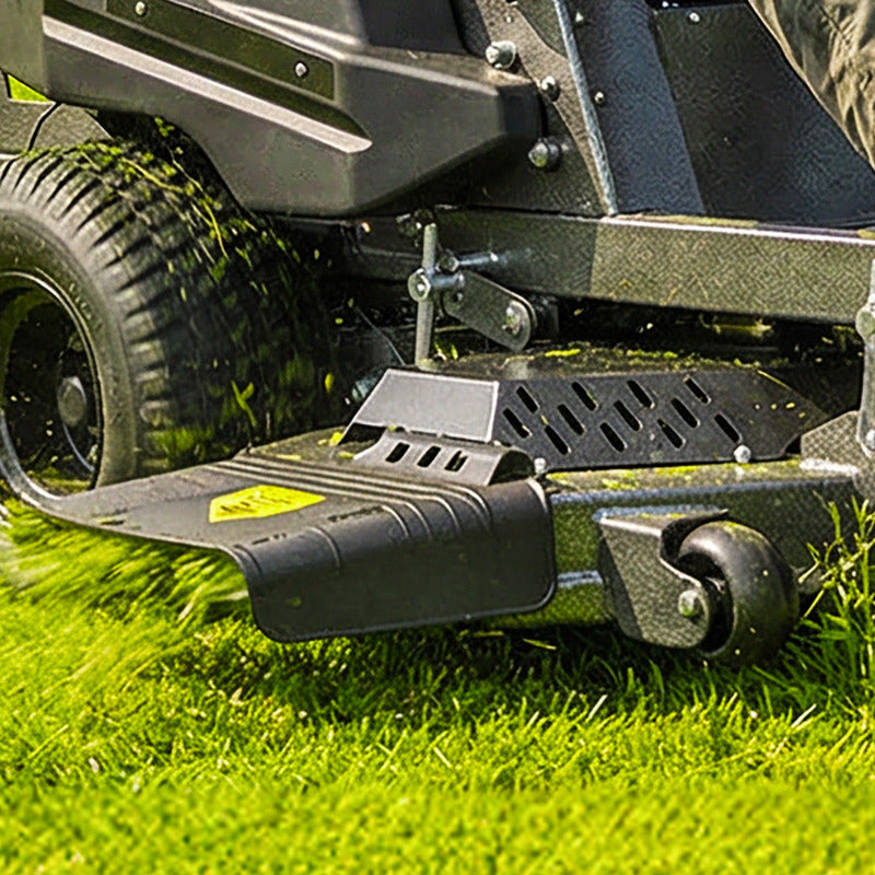 Close-up of the cutting deck of a Cobra ZTR50L zero turn lawn mower on grass