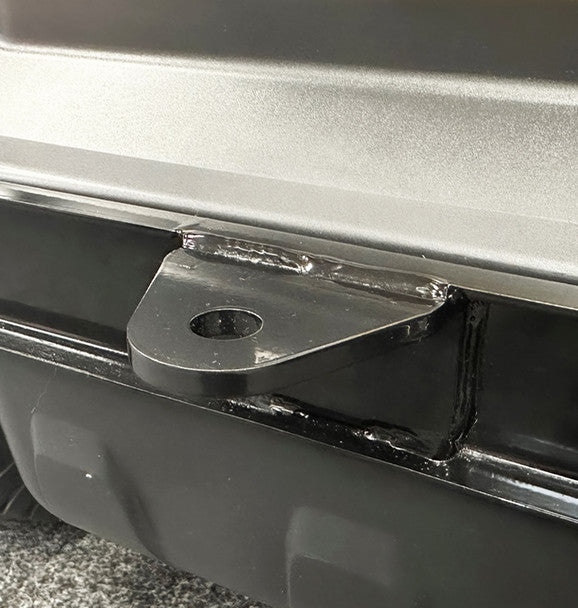 Metal hitch receiver on a  bumper
