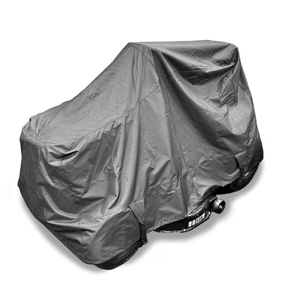 Cobra tractor cover over a lawn tractor with a white background 