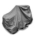 Cobra tractor cover over a lawn tractor with a white background 